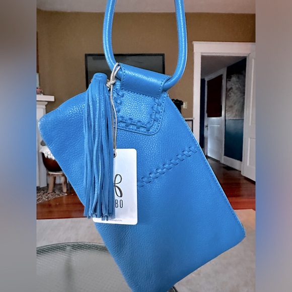 HOBO Handbags - HOBO Sable wristlet tumbled leather with tassel in dusty blue